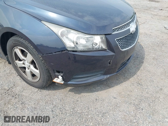 2014 Chevrolet Cruze 1LT with VIN 1G1PC5SB3E7469236, listed as a IAAI auction lot 42492007 with Not provided miles and . Bid and sale history available at DreamBid. Image 6.