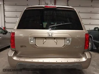 2004 Honda Pilot EX with VIN 2HKYF18464H567384, listed as a IAAI auction lot 41790773 with 142,534 mi miles. Bid and sale history available at carsss.com. Image 12.