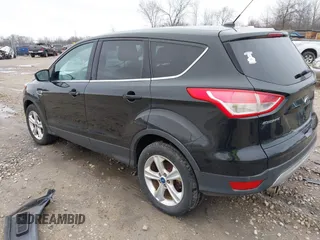 2013 Ford Escape SE with VIN 1FMCU9G94DUA21681, listed as a IAAI auction lot 42057896 with 197,257 mi miles. Bid and sale history available at carsss.com. Image 3.