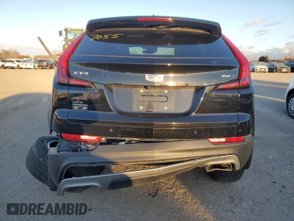 2022 Cadillac XT4 AWD Premium Luxury with VIN 1GYFZDR45NF109999, listed as a Copart auction lot 84618914 with 66,697 mi miles and Clean title. Bid and sale history available at DreamBid. Image 6.