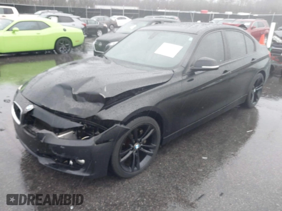 2015 BMW 3 Series 328i with VIN WBA3A5G54FNS88834, listed as a IAAI auction lot 41712756 with 51,599 mi miles. Bid and sale history available at carsss.com. Image 2.