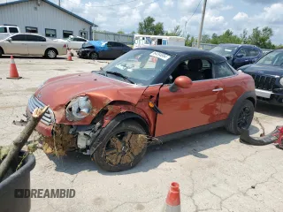 2014 MINI Cooper Coupe with VIN WMWSX1C53ET507902, listed as a Copart auction lot 64094884 with 0 mi miles and Salvage Title. Bid and sale history available at carsss.com. Image 1.