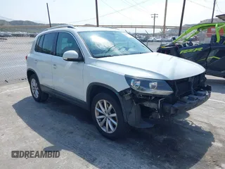 2017 Volkswagen Tiguan Wolfsburg Edition with VIN WVGRV7AX1HW500816, listed as a IAAI auction lot 42167262 with 127,636 mi miles and . Bid and sale history available at DreamBid. Image 1.