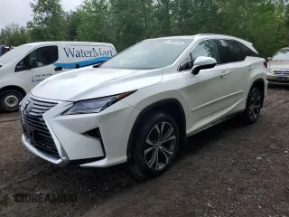 2019 Lexus RX 350L Premium with VIN JTJDZKCA1K2014498, listed as a Copart auction lot 61896135 with 84,911 mi miles and Salvage title. Bid and sale history available at DreamBid. Image 1.