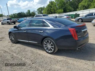 2015 Cadillac XTS Luxury z VIN 2G61M5S32F9169354, wystawiony jako Copart lot #54887215 z przebiegiem 138 795 mil mil oraz Szkoda całkowita • Salvage title. Historia ofert i sprzedaży dostępna na DreamBid. Obrazek 2.