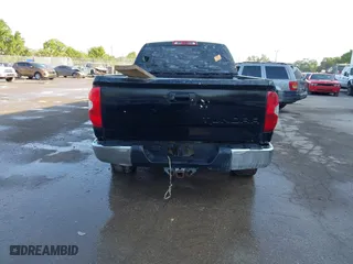 2014 Toyota Tundra 4WD Truck SR with VIN 5TFUW5F1XEX377799, listed as a IAAI auction lot 41889381 with 225,551 mi miles. Bid and sale history available at carsss.com. Image 16.