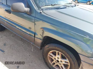 2002 Jeep Grand Cherokee Laredo с VIN 1J4GX48S42C287863, выставлен на аукционе IAAI как лот 41982433 с пробегом Не указан миль и . История ставок и продаж доступна на DreamBid. Изображение 6.