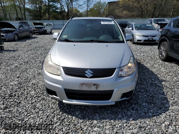 2007 Suzuki SX4 z VIN JS2YB413175106909, wystawiony jako Copart lot #55733055 z przebiegiem 152 703 mil mil oraz Tytuł czysty. Historia ofert i sprzedaży dostępna na DreamBid. Obrazek 5.