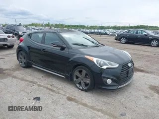 2015 Hyundai Veloster Turbo with VIN KMHTC6AE7FU235641, listed as a IAAI auction lot 42161581 with 144,679 mi miles and . Bid and sale history available at DreamBid. Image 1.