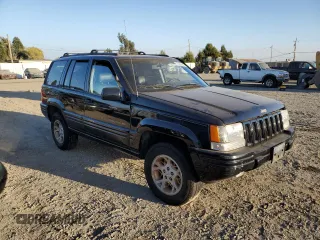 1998 Jeep Grand Cherokee Limited with VIN 1J4GZ78Y9WC322919, listed as a Copart auction lot 73225994 with 171,474 mi miles and Salvage Title. Bid and sale history available at carsss.com. Image 4.