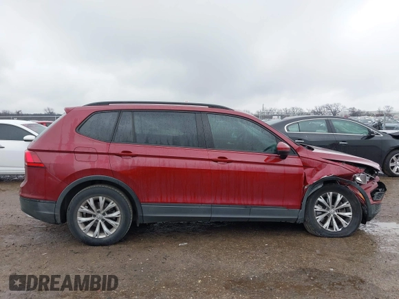 2018 Volkswagen Tiguan S with VIN 3VV1B7AX8JM124827, listed as a IAAI auction lot 41544321 with 101,492 mi miles and . Bid and sale history available at DreamBid. Image 13.