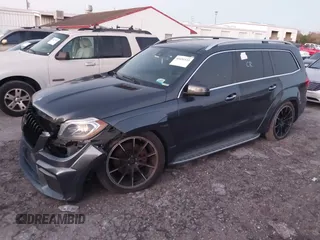 2014 Mercedes-Benz GL-Class GL 550 with VIN 4JGDF7DE9EA329761, listed as a IAAI auction lot 41651533 with 113,056 mi miles. Bid and sale history available at carsss.com. Image 2.