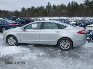2014 Ford Fusion SE Hybrid with VIN 3FA6P0LUXER172442, listed as a IAAI auction lot 41623540 with 195,843 mi miles. Bid and sale history available at carsss.com. Image 14.