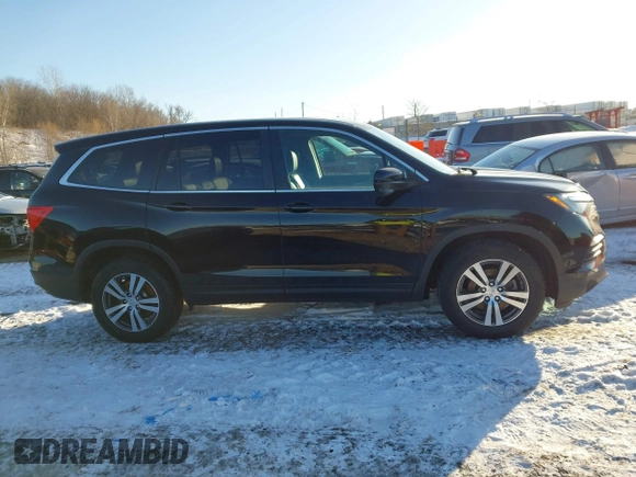 2016 Honda Pilot EX-L with VIN 5FNYF6H7XGB115951, listed as a IAAI auction lot 41642756 with 101,688 mi miles. Bid and sale history available at carsss.com. Image 13.