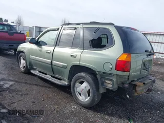 2003 GMC Envoy SLT with VIN 1GKDT13SX32161898, listed as a IAAI auction lot 41642072 with 230,154 mi miles. Bid and sale history available at carsss.com. Image 3.