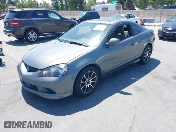 2005 Acura RSX with VIN JH4DC53855S011075, listed as a IAAI auction lot 42506213 with 214,187 mi miles and . Bid and sale history available at DreamBid. Image 2.
