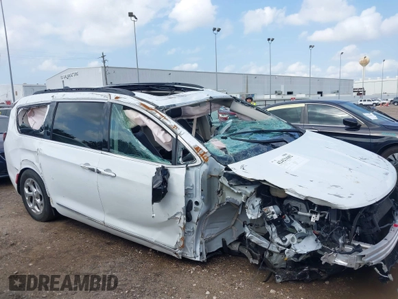 2023 Chrysler Pacifica Limited with VIN 2C4RC1GG4PR619997, listed as a IAAI auction lot 42421682 with 51,520 mi miles and . Bid and sale history available at DreamBid. Image 16.