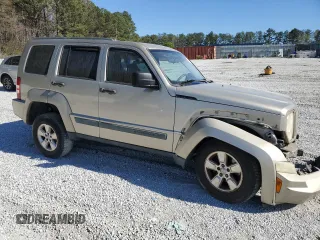 2010 Jeep Liberty Sport with VIN 1J4PP2GK9AW128825, listed as a Copart auction lot 48113835 with 258,730 mi miles and Salvage Title. Bid and sale history available at DreamBid. Image 4.