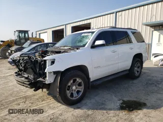 2019 Chevrolet Tahoe LS z VIN 1GNSKAKC9KR408941, wystawiony jako Copart lot #49111865 z przebiegiem 74 131 mil mil oraz Szkoda całkowita • Salvage title. Historia ofert i sprzedaży dostępna na DreamBid. Obrazek 1.