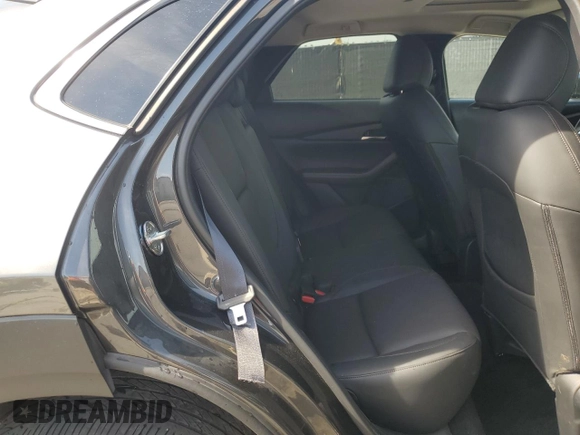 2023 Mazda CX-30 S Premium z VIN 3MVDMBDM9PM558451, wystawiony jako Copart lot #53997465 z przebiegiem 27 633 mil mil oraz Nie do naprawy • Non repairable. Historia ofert i sprzedaży dostępna na DreamBid. Obrazek 11.