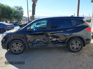 2019 Honda Passport EX-L with VIN 5FNYF7H58KB005624, listed as a IAAI auction lot 41344058 with 63,867 mi miles and . Bid and sale history available at carsss.com. Image 14.