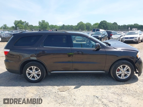 2013 Dodge Durango SXT with VIN 1C4RDJAG7DC580249, listed as a IAAI auction lot 42535723 with 199,626 mi miles and . Bid and sale history available at DreamBid. Image 13.