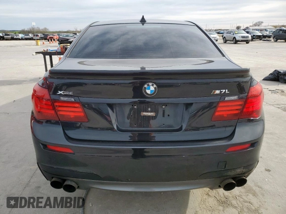 2015 BMW 7 Series 750Li xDrive z VIN WBAYF8C54FD654540, wystawiony jako Copart lot #49346035 z przebiegiem 98 336 mil mil oraz Szkoda całkowita • Salvage title. Historia ofert i sprzedaży dostępna na DreamBid. Obrazek 6.