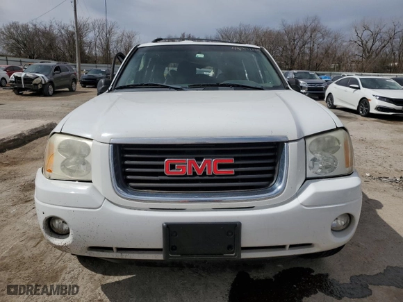 2003 GMC Envoy SLE with VIN 1GKDS13SX32259798, listed as a Copart auction lot 48712015 with 100,330 mi miles and Salvage Title. Bid and sale history available at carsss.com. Image 5.