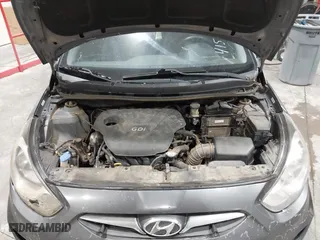 2013 Hyundai Accent GL with VIN KMHCT5AEXDU100208, listed as a IAAI auction lot 41517792 with 164,510 mi miles. Bid and sale history available at carsss.com. Image 10.