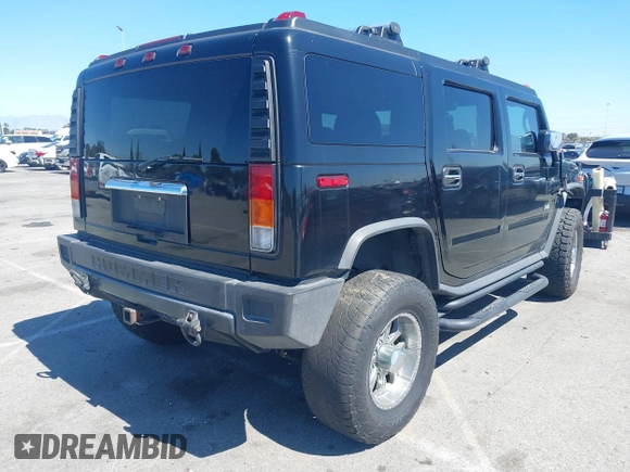 2003 Hummer H2 z VIN 5GRGN23U63H117676, wystawiony jako IAAI lot #41816411 z przebiegiem Nie podano mil oraz . Historia ofert i sprzedaży dostępna na DreamBid. Obrazek 4.