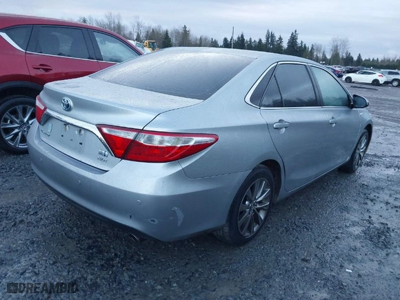 2016 Toyota Camry Hybrid LE with VIN 4T1BD1FK1GU188991, listed as a IAAI auction lot 41302192 with 89,311 mi miles. Bid and sale history available at carsss.com. Image 4.