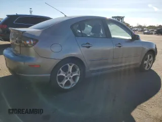 2005 Mazda 3 s with VIN JM1BK323351343009, listed as a Copart auction lot 45274015 with 124,019 mi miles and Clean Title. Bid and sale history available at carsss.com. Image 3.