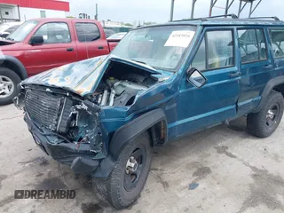 1996 Jeep Cherokee SE z VIN 1J4FJ28S8TL285634, wystawiony jako IAAI lot #42183816 z przebiegiem 260 237 mil mil oraz . Historia ofert i sprzedaży dostępna na DreamBid. Obrazek 6.