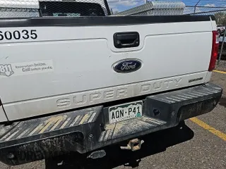 2016 Ford Super Duty F-250 SRW XLT with VIN 1FT7X2B6XGEB63047, listed as a IAAI auction lot 42141698 with 203,235 mi miles. Bid and sale history available at carsss.com. Image 1.