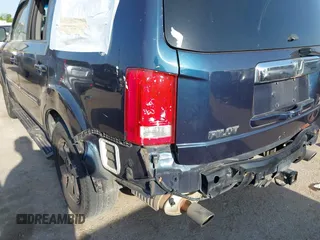 2011 Honda Pilot Touring with VIN 5FNYF4H92BB090056, listed as a IAAI auction lot 42010682 with 201,640 mi miles. Bid and sale history available at carsss.com. Image 18.