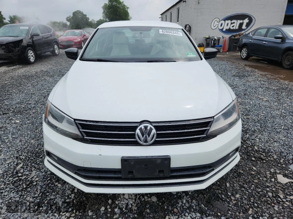 2015 Volkswagen Jetta SE z VIN 3VWD17AJ7FM220222, wystawiony jako Copart lot #62866345 z przebiegiem 68 273 mil mil oraz Szkoda całkowita • Salvage title. Historia ofert i sprzedaży dostępna na DreamBid. Obrazek 5.