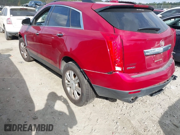 2015 Cadillac SRX z VIN 3GYFNAE3XFS572970, wystawiony jako IAAI lot #40854902 z przebiegiem 124 779 mil mil oraz . Historia ofert i sprzedaży dostępna na DreamBid. Obrazek 3.