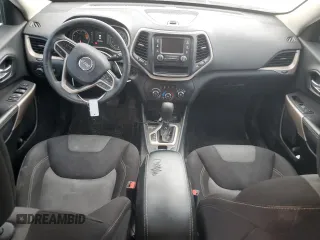2017 Jeep Cherokee Sport with VIN 1C4PJLAB0HW669519, listed as a Copart auction lot 50829425 with 138,190 mi miles and Salvage Title. Bid and sale history available at carsss.com. Image 8.