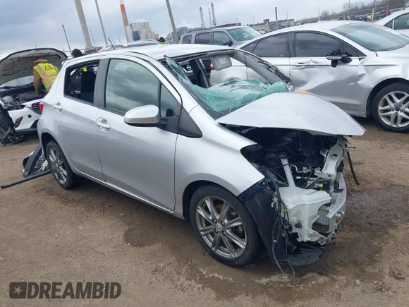 2012 Toyota Yaris L with VIN JTDKTUD35CD518484, listed as a IAAI auction lot 41863849 with 106,024 mi miles. Bid and sale history available at carsss.com. Image 1.