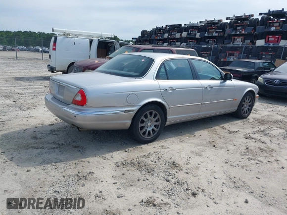 2004 Jaguar XJ 8 z VIN SAJWA71C24SG32778, wystawiony jako IAAI lot #42265164 z przebiegiem 155 872 mil mil oraz . Historia ofert i sprzedaży dostępna na DreamBid. Obrazek 4.