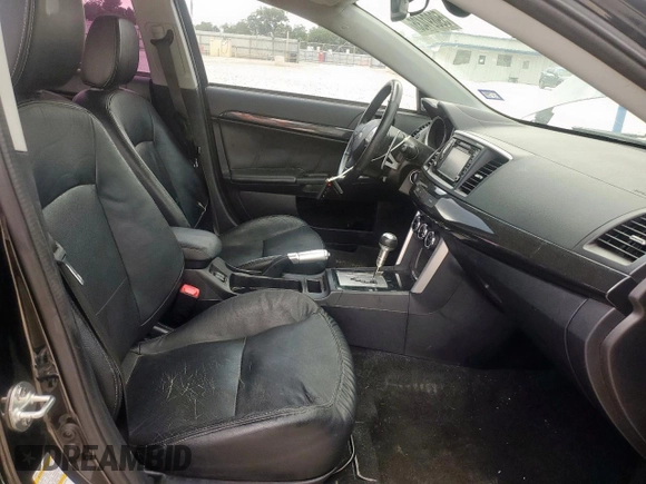 2016 Mitsubishi Lancer GT with VIN JA32U8FWXGU008597, listed as a Copart auction lot 59891435 with 131,632 mi miles and Salvage title. Bid and sale history available at DreamBid. Image 7.