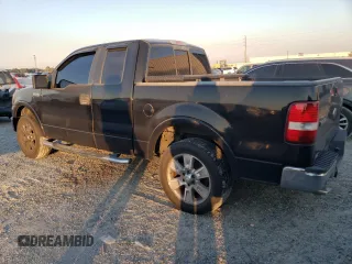 2005 Ford F-150 XLT with VIN 1FTRX12515FB28205, listed as a Copart auction lot 82707324 with 249,349 mi miles and Salvage Title. Bid and sale history available at carsss.com. Image 2.