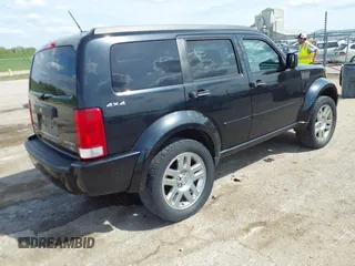 2011 Dodge Nitro Heat with VIN 1D4PU4GX9BW607580, listed as a IAAI auction lot 42105529 with 143,795 mi miles. Bid and sale history available at carsss.com. Image 4.