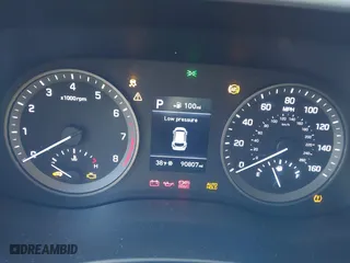 2019 Hyundai Tucson Value with VIN KM8J33A4XKU979791, listed as a IAAI auction lot 41255630 with 90,807 mi miles. Bid and sale history available at carsss.com. Image 7.