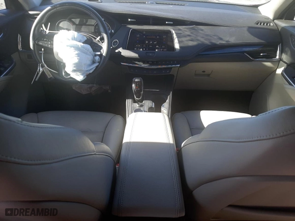 2023 Cadillac XT4 FWD Premium Luxury with VIN 1GYFZCR43PF158499, listed as a Copart auction lot 58021974 with 9,497 mi miles and Salvage Title. Bid and sale history available at carsss.com. Image 8.