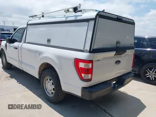 2021 Ford F-150 XL with VIN 1FTMF1CB2MKD85770, listed as a IAAI auction lot 42175883 with 129,366 mi miles and . Bid and sale history available at DreamBid. Image 3.