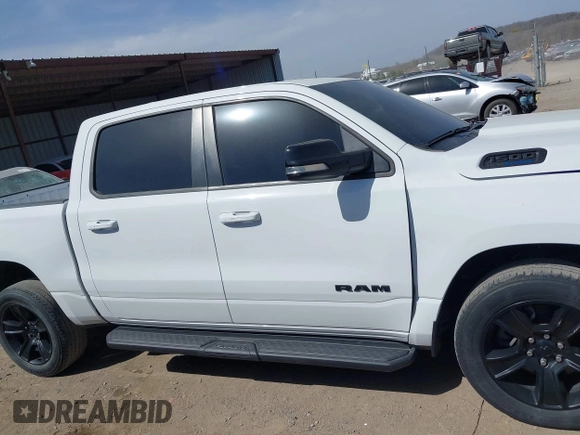 2021 Ram 1500 Big Horn with VIN 1C6SRFFT0MN521027, listed as a IAAI auction lot 41830596 with 55,013 mi miles and . Bid and sale history available at DreamBid. Image 14.
