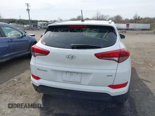 2017 Hyundai Tucson SE with VIN KM8J3CA44HU437644, listed as a IAAI auction lot 41825957 with 59,402 mi miles. Bid and sale history available at carsss.com. Image 17.