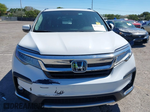 2022 Honda Pilot Touring 7-Passenger с VIN 5FNYF5H66NB034248, выставлен на аукционе IAAI как лот 41777362 с пробегом 26 611 миль миль и . История ставок и продаж доступна на DreamBid. Изображение 11.