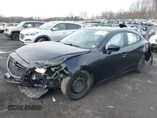 2015 Mazda 3 i SV with VIN JM1BM1T79F1237259, listed as a IAAI auction lot 40971092 with 140,871 mi miles. Bid and sale history available at carsss.com. Image 17.